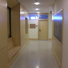 Corridor with bench and blackboard
