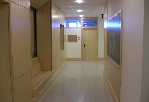 Corridor with bench and blackboard