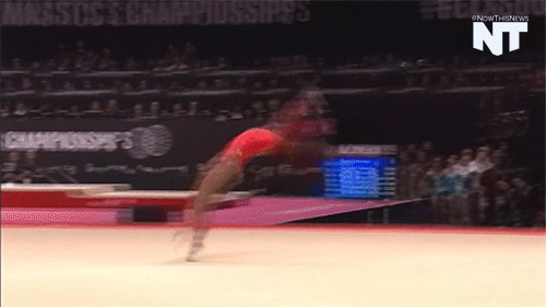 Simone Biles landing part of a triple double in a gymnastics floor routine. Source: USA Today