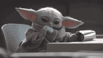 Grogu, one of the main characters in The Madalorian, eating a cookie. Source: Disney